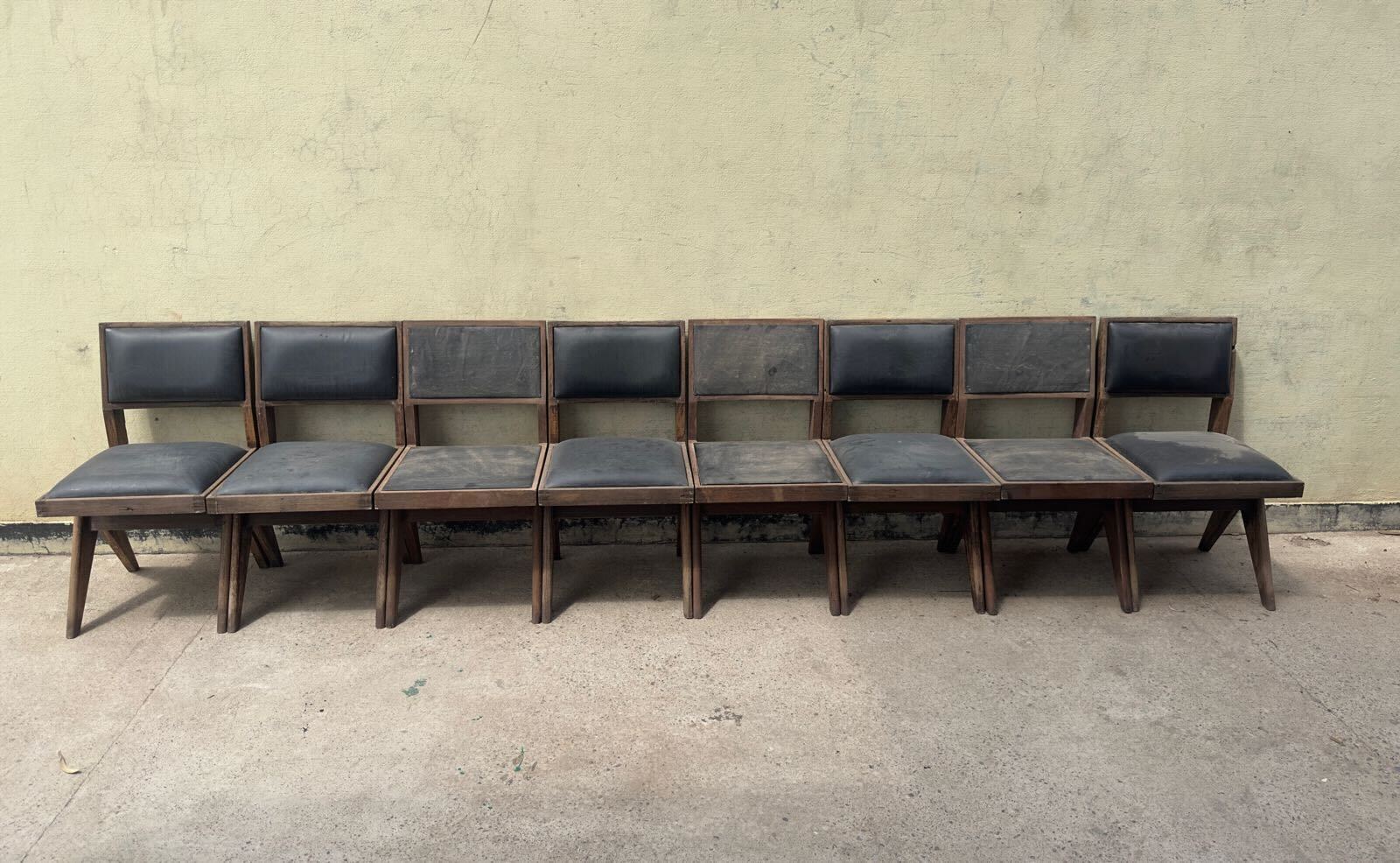 Set of 8 armless office chairs. Available for individual purchase.